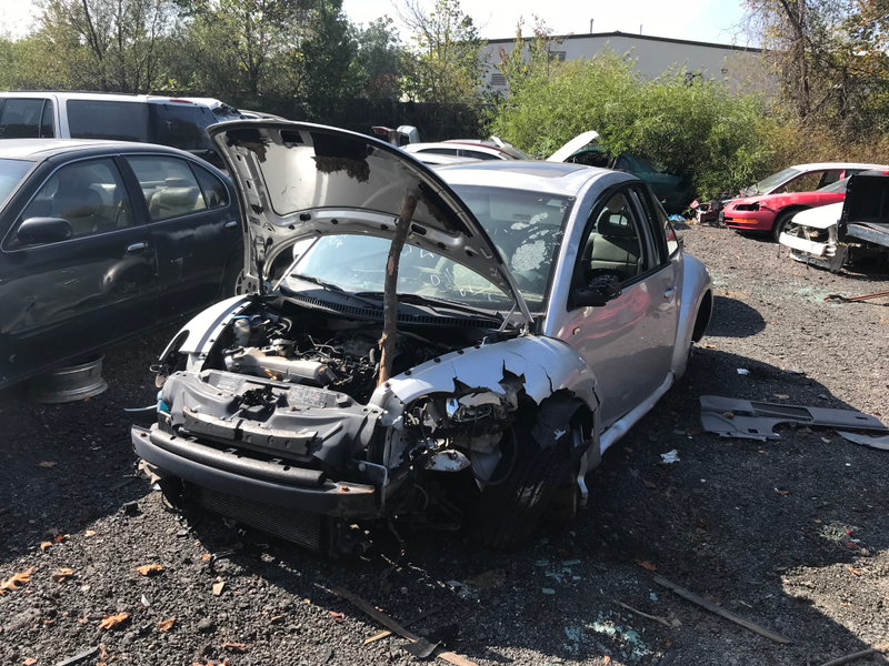 Busted-up VW bug.